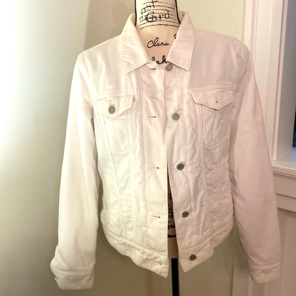 A larger light beige Corduroy coat from Gap. Used couple of times.